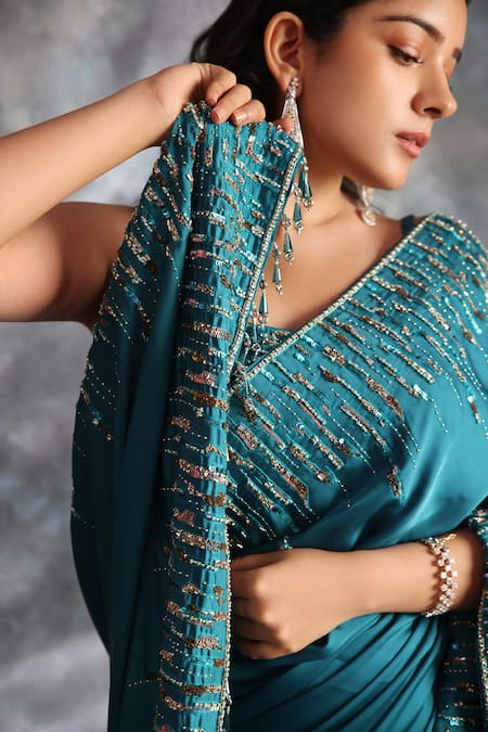 Kaaisha By Shalini Green Satin Cut Work, Sequins Round Neck Embellished Border Saree With Blouse Online at Aza Fashions Kaaisha By Shalini_Green Satin Cut Work, Sequins Round Neck Embellished Border Saree With Blouse_Online_at_Aza_Fashions