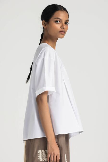 Shop Three White Cotton Round Neck Asymmetric Pleated Top Online at Aza Fashions Shop_Three_White Cotton Round Neck Asymmetric Pleated Top _Online_at_Aza_Fashions