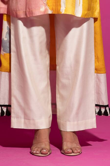 Shop Saksham & Neharicka Yellow Cotton Satin Tassels Scoop Abstract Print High Low Kurta With Palazzo Online at Aza Fashions Shop_Saksham & Neharicka_Yellow Cotton Satin Tassels Scoop Abstract Print High Low Kurta With Palazzo_Online_at_Aza_Fashions