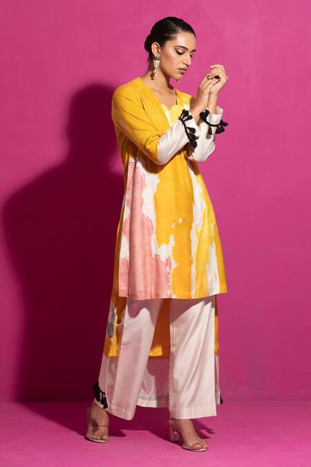Saksham & Neharicka Yellow Cotton Satin Tassels Scoop Abstract Print High Low Kurta With Palazzo at Aza Fashions Saksham & Neharicka_Yellow Cotton Satin Tassels Scoop Abstract Print High Low Kurta With Palazzo_at_Aza_Fashions