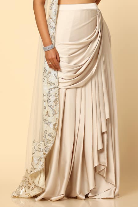 Meenagurnam_Ivory Satin, Net Sequins, Piping Round Neck Embroidered Cape Skirt Set _at_Aza_Fashions
