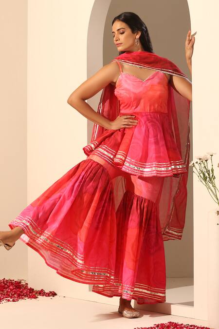 Shop_Pomcha Jaipur_Pink Muslin, Chiffon Gota Patti V-neck Gul Bahaar Peplum Tunic And Sharara Set _Online_at_Aza_Fashions