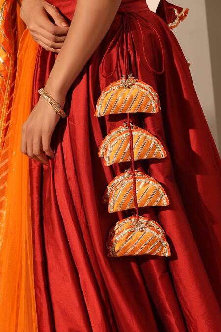 Shop_Pomcha Jaipur_Red Taffeta, Net Tassels, Gota Patti V-neck Gul Solid Lehenga Set _Online_at_Aza_Fashions