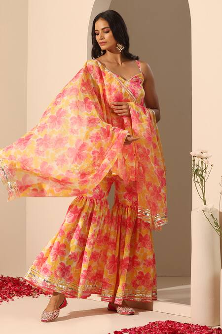 Pomcha Jaipur_Yellow Muslin, Chiffon Gul Rangrez Floral Pattern Peplum Tunic Sharara Set _at_Aza_Fashions