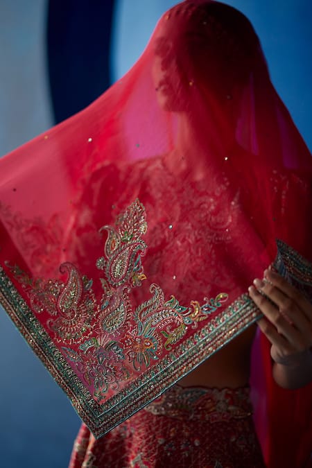 Shop Mrunalini Rao Red Leather, Organza, Silk Embroidery, Zari Round Radha Raw Bridal Lehenga Set Online at Aza Fashions Shop_Mrunalini Rao_Red Leather, Organza, Silk Embroidery, Zari Round Radha Raw Bridal Lehenga Set _Online_at_Aza_Fashions