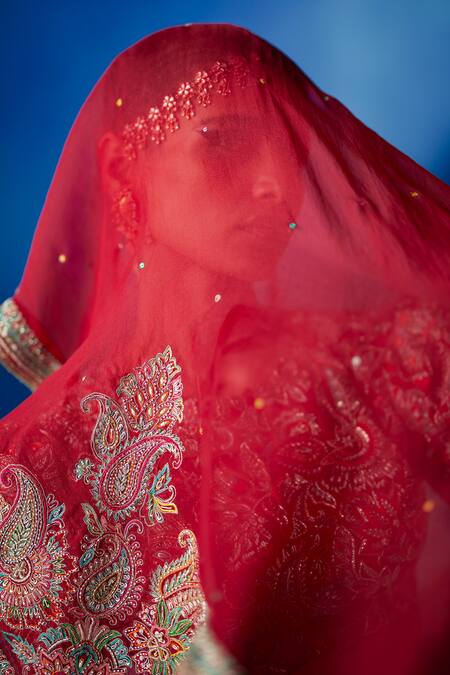 Mrunalini Rao Red Leather, Organza, Silk Embroidery, Zari Round Radha Raw Bridal Lehenga Set at Aza Fashions Mrunalini Rao_Red Leather, Organza, Silk Embroidery, Zari Round Radha Raw Bridal Lehenga Set _at_Aza_Fashions