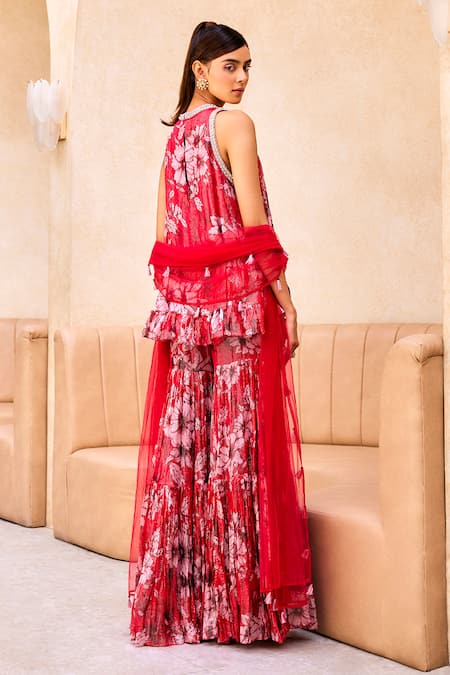 Shop Label Sanya Gulati Red Georgette, Net Embroidery Round Neck Floral Print Flared Tunic Sharara Set at Aza Fashions Shop_Label Sanya Gulati_Red Georgette, Net Embroidery Round Neck Floral Print Flared Tunic Sharara Set _at_Aza_Fashions