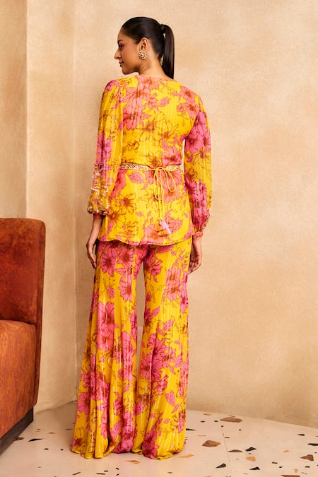 Shop Label Sanya Gulati Yellow Georgette, Cotton Tassels, Floral Print Ruffle Shirt And Gharara Set at Aza Fashions Shop_Label Sanya Gulati_Yellow Georgette, Cotton Tassels, Floral Print Ruffle Shirt And Gharara Set _at_Aza_Fashions
