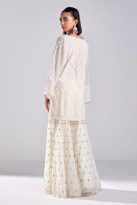 Shop Diyarajvvir Ivory Satin, Lycra, Tulle, Cotton, Silk Chevron Embroidered Kurta Gharara Set at Aza Fashions Shop_Diyarajvvir_Ivory Satin, Lycra, Tulle, Cotton, Silk Chevron Embroidered Kurta Gharara Set _at_Aza_Fashions