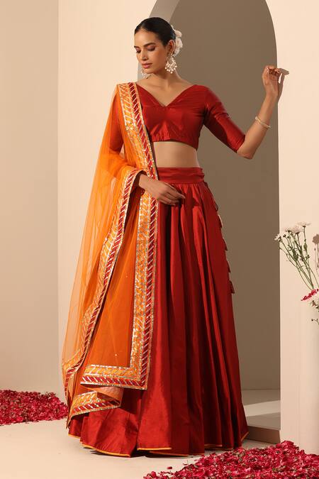 Pomcha Jaipur_Red Taffeta, Net Tassels, Gota Patti V-neck Gul Solid Lehenga Set _at_Aza_Fashions