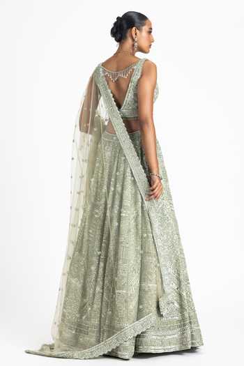 Shop Nitika Gujral Green Net Sequins, Crystals V-neck Tonal Embellished Bridal Lehenga Set at Aza Fashions Shop_Nitika Gujral_Green Net Sequins, Crystals V-neck Tonal Embellished Bridal Lehenga Set _at_Aza_Fashions