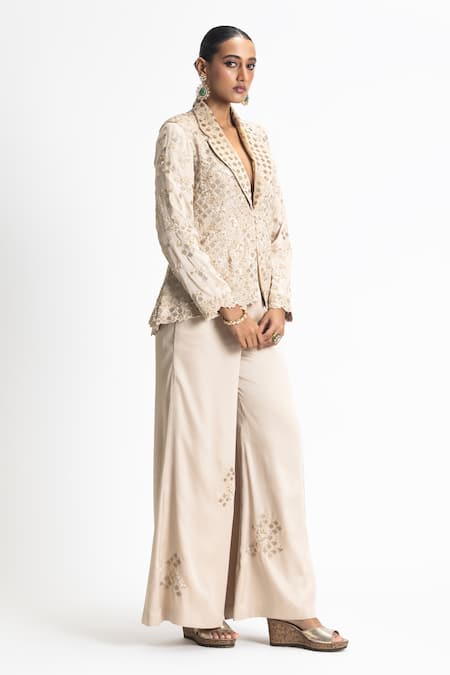 Nitika Gujral_Gold Satin Sequins, Beads, Zari Collared Embroidered Jacket And Trouser Set _Online_at_Aza_Fashions