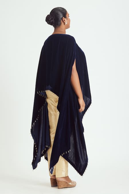 Shop Nitika Gujral Blue Velvet, Lycra, Brocade Tassels, Embroidery Boat Zari Poncho Trouser Set at Aza Fashions Shop_Nitika Gujral_Blue Velvet, Lycra, Brocade Tassels, Embroidery Boat Zari Poncho Trouser Set _at_Aza_Fashions