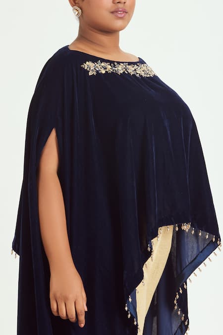 Buy Nitika Gujral Blue Velvet, Lycra, Brocade Tassels, Embroidery Boat Zari Poncho Trouser Set Online at Aza Fashions Buy_Nitika Gujral_Blue Velvet, Lycra, Brocade Tassels, Embroidery Boat Zari Poncho Trouser Set _Online_at_Aza_Fashions