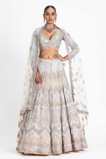 Buy Nitika Gujral Pink Satin, Net Sequins, Beads, Crystals And Embroidered Bridal Lehenga Set at Aza Fashions Buy_Nitika Gujral_Pink Satin, Net Sequins, Beads, Crystals And Embroidered Bridal Lehenga Set _at_Aza_Fashions