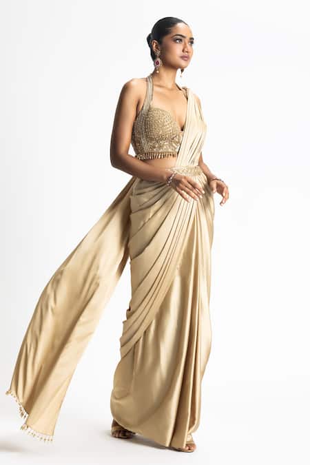 Nitika Gujral Gold Satin, Organza Beads Halter Neck Pleated Pallu Pre-draped Saree With Blouse Online at Aza Fashions Nitika Gujral_Gold Satin, Organza Beads Halter Neck Pleated Pallu Pre-draped Saree With Blouse _Online_at_Aza_Fashions