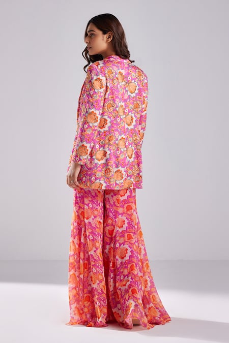 Shop Diyarajvvir Fuchsia Georgette, Modal Tassels, Flower Print Blazer Bell Bottom Pant Set at Aza Fashions Shop_Diyarajvvir_Fuchsia Georgette, Modal Tassels, Flower Print Blazer Bell Bottom Pant Set _at_Aza_Fashions