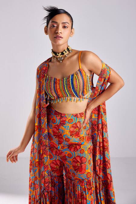 Shop Diyarajvvir Orange Crepe, Modal Tassels, Floral Garden Print High Low Cape Gharara Set Online at Aza Fashions Shop_Diyarajvvir_Orange Crepe, Modal Tassels, Floral Garden Print High Low Cape Gharara Set _Online_at_Aza_Fashions