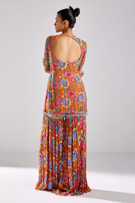 Shop Diyarajvvir Orange Georgette, Tulle Tassels Round Neck Garden Print Kurta Gharara Set at Aza Fashions Shop_Diyarajvvir_Orange Georgette, Tulle Tassels Round Neck Garden Print Kurta Gharara Set _at_Aza_Fashions