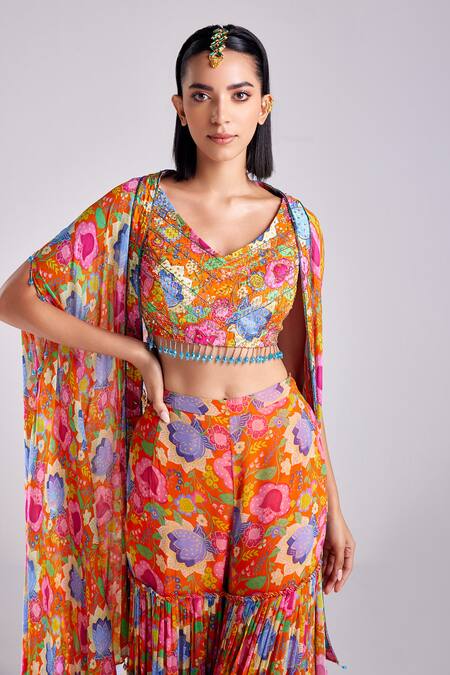 Buy Diyarajvvir Orange Modal, Georgette Crystals, Tassels V-neck Flower Print Cape Gharara Set Online at Aza Fashions Buy_Diyarajvvir_Orange Modal, Georgette Crystals, Tassels V-neck Flower Print Cape Gharara Set _Online_at_Aza_Fashions
