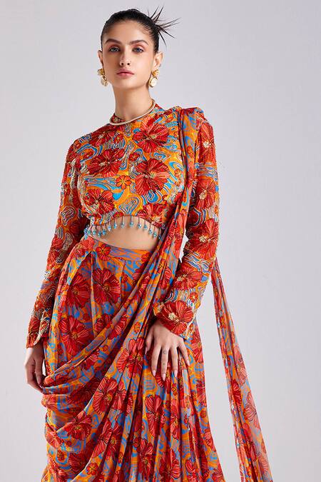 Diyarajvvir Orange Georgette, Modal Tassels Round Rust Floral Wave Print Pre Draped Saree Online at Aza Fashions Diyarajvvir_Orange Georgette, Modal Tassels Round Rust Floral Wave Print Pre Draped Saree _Online_at_Aza_Fashions