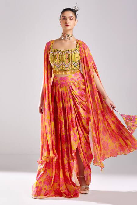 Buy Diyarajvvir Pink Cotton, Silk, Georgette Beads, Hibiscus Garden Print Cape Dhoti Skirt Set Online at Aza Fashions Buy_Diyarajvvir_Pink Cotton, Silk, Georgette Beads, Hibiscus Garden Print Cape Dhoti Skirt Set _Online_at_Aza_Fashions