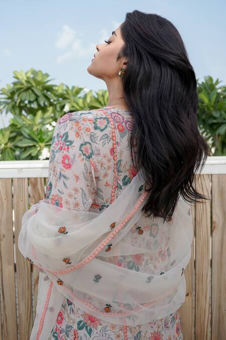 Shop Gulabo Jaipur Peach Muslin Sequins Split V-neck Muskan Floral Print Straight Kurta Pant Set at Aza Fashions Shop_Gulabo Jaipur_Peach Muslin Sequins Split V-neck Muskan Floral Print Straight Kurta Pant Set_at_Aza_Fashions