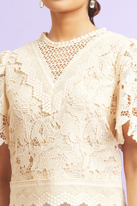 Samyukta Singhania_Cream Lace Embroidery Round Neck Floral Cutwork Top _at_Aza_Fashions