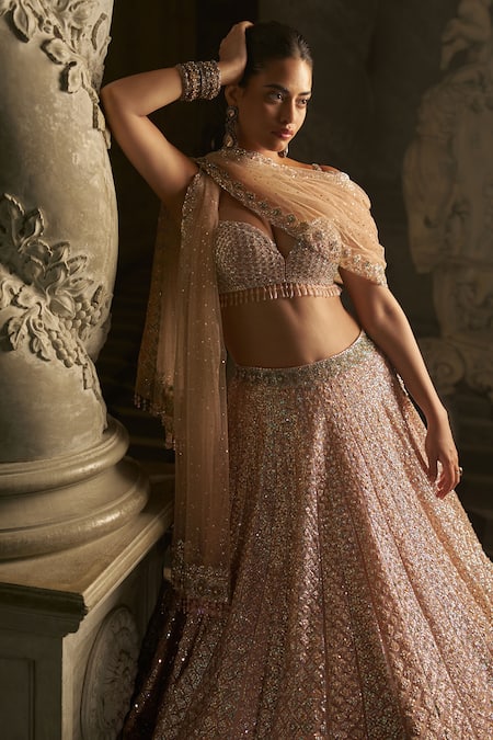 Seema Gujral_Peach Net Sequins, Beads Sweetheart Neck Tonal Embroidered Bridal Lehenga Set _Online_at_Aza_Fashions