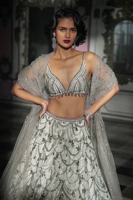 Shop_Seema Gujral_White Net Crystals, Sequins V-neck Chandelier Embroidered Bridal Lehenga Set _Online_at_Aza_Fashions