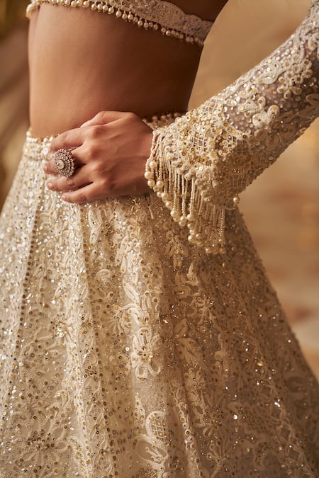 Shop_Seema Gujral_Ivory Net Pearls, Sequins Plunge Neck And Embroidered Bridal Lehenga Set _Online_at_Aza_Fashions