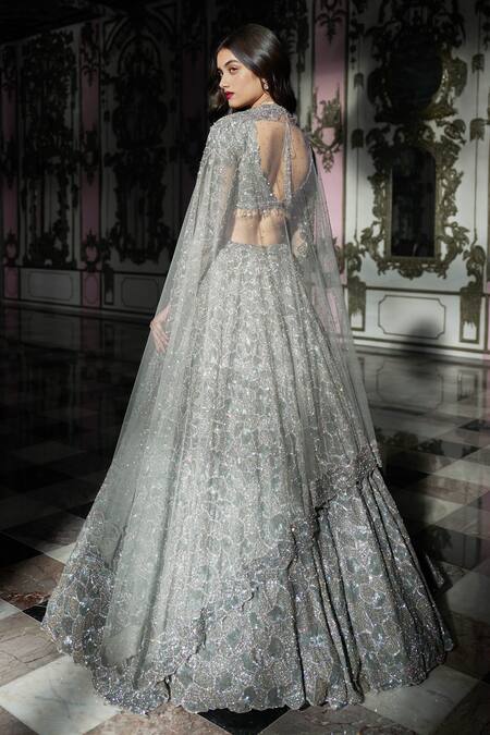 Shop_Seema Gujral_Silver Net Embroidered Sequins Plunging V Neck Blouse Bridal Lehenga Set_Online_at_Aza_Fashions