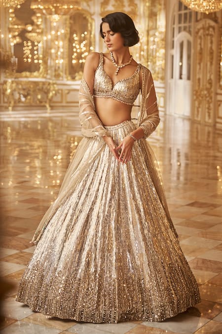 Seema Gujral Gold Net Embroidered Sequins Leaf Neck And Crystals Bridal Lehenga Set 