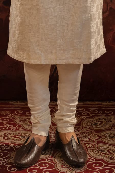 Darshika Menswear Ivory , Satin Zari Floral Zardozi Embroidered Bundi Set at Aza Fashions Darshika Menswear_Ivory , Satin Zari Floral Zardozi Embroidered Bundi Set _at_Aza_Fashions