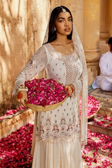 Amitabh Malhotra_Ivory Georgette, Net Beads, Tassels, Mirrors, Embellished Kurta Skirt Set _at_Aza_Fashions
