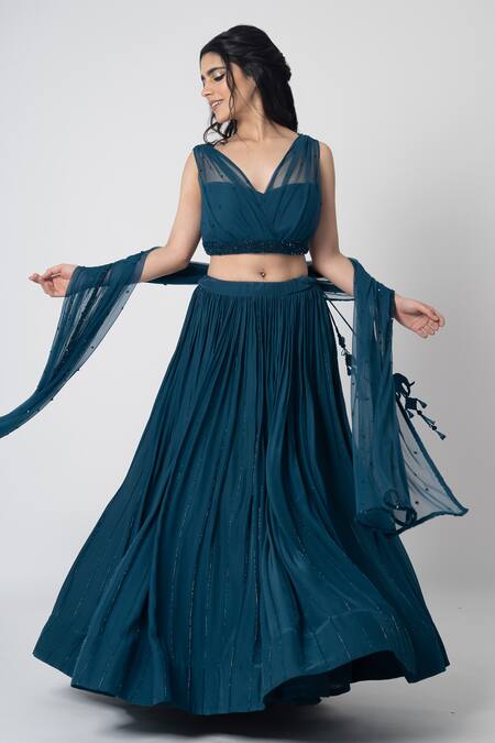 Label Shristi Chetani_Blue Crepe Cut Work V-neck Ambar Hand Embroidered Blouse Lehenga Set _Online_at_Aza_Fashions