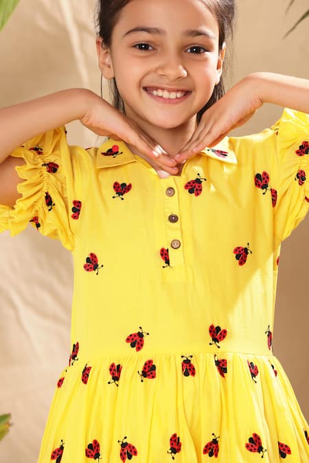 Littlecheer Yellow Cotton Embroidery Flared Ladybug Dress at Aza Fashions Littlecheer_Yellow Cotton Embroidery Flared Ladybug Dress _at_Aza_Fashions