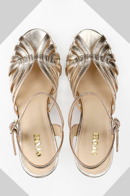 Shop Oroh Gold Cut Work Topaz Metallic Sandals at Aza Fashions Shop_Oroh_Gold Cut Work Topaz Metallic Sandals _at_Aza_Fashions