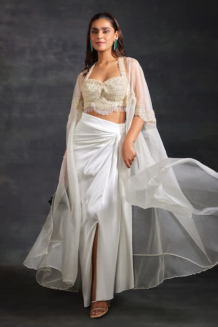 The House of Exotique Ivory Organza Embellished Beads Sheer Cape Asymmetric Skirt Set  