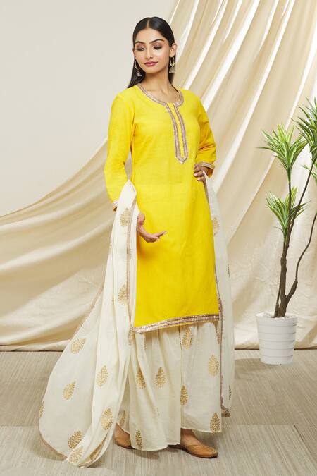 Shop Peenacolada Yellow Cotton, Muslin Gota Patti, Zari, Foil Printing Round Neck Gharara Set Online at Aza Fashions Shop_Peenacolada_Yellow Cotton, Muslin Gota Patti, Zari, Foil Printing Round Neck Gharara Set _Online_at_Aza_Fashions