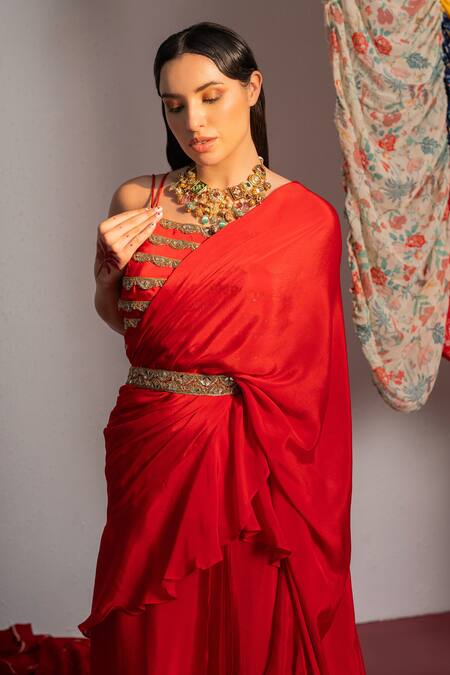 Redpine Designs Red Viscose, Crepe Sequins Square Neck Solid Ruffle Pre Draped Saree With Blouse at Aza Fashions Redpine Designs_Red Viscose, Crepe Sequins Square Neck Solid Ruffle Pre Draped Saree With Blouse _at_Aza_Fashions