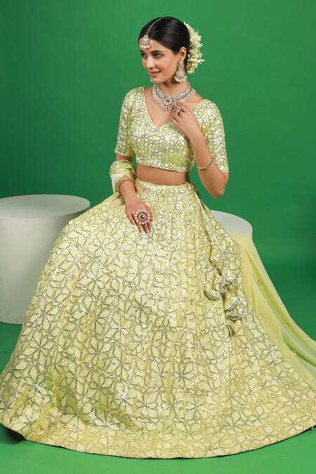 Kohsh_Yellow Georgette Sequins, Embroidery V-neck Floral Lehenga Set_Online_at_Aza_Fashions