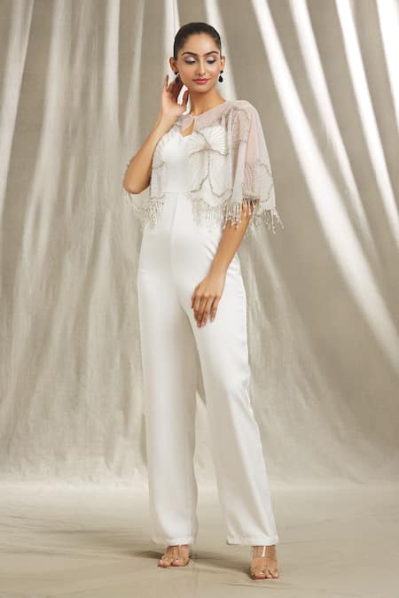 Shop Shivani Awasty Ivory Tulle, Crepe Crystals, Cut Work, Sleeveless Jumpsuit With Embroidered Cape Online at Aza Fashions Shop_Shivani Awasty_Ivory Tulle, Crepe Crystals, Cut Work, Sleeveless Jumpsuit With Embroidered Cape _Online_at_Aza_Fashions
