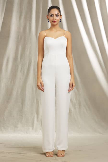 Shivani Awasty Ivory Tulle, Crepe Crystals, Cut Work, Sleeveless Jumpsuit With Embroidered Cape at Aza Fashions Shivani Awasty_Ivory Tulle, Crepe Crystals, Cut Work, Sleeveless Jumpsuit With Embroidered Cape _at_Aza_Fashions
