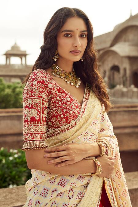 Annus Creation Red Silk, Organza Cut Work, Pearls V-neck Cutdana Embroidered Lehenga Set Online at Aza Fashions Annus Creation_Red Silk, Organza Cut Work, Pearls V-neck Cutdana Embroidered Lehenga Set_Online_at_Aza_Fashions