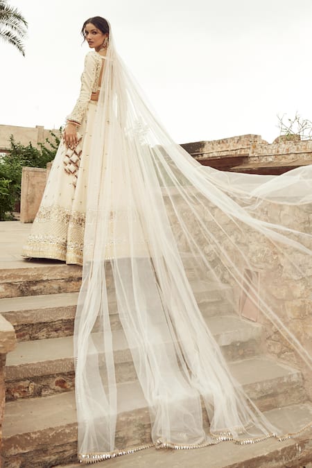 Shop Annus Creation Ivory Silk, Organza Pearls, Cut Embroidered Floral Elephant Bridal Lehenga Set at Aza Fashions Shop_Annus Creation_Ivory Silk, Organza Pearls, Cut Embroidered Floral Elephant Bridal Lehenga Set_at_Aza_Fashions