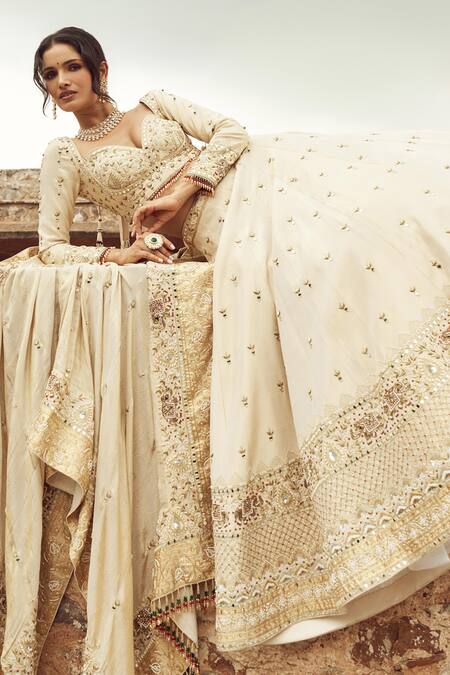 Buy Annus Creation Ivory Silk, Organza Pearls, Cut Embroidered Floral Elephant Bridal Lehenga Set Online at Aza Fashions Buy_Annus Creation_Ivory Silk, Organza Pearls, Cut Embroidered Floral Elephant Bridal Lehenga Set_Online_at_Aza_Fashions