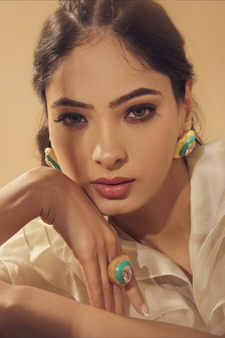 Janvi Sachdeva Design_Gold Plated Imitation Diamonds Cubic Zirconia Embellished Studs _Online_at_Aza_Fashions