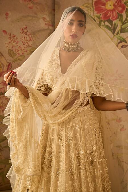 Shop Ridhi Mehra Ivory Lehenga And Dupatta Organza Embroidery Thread Stripe Bridal Set Online at Aza Fashions Shop_Ridhi Mehra_Ivory Lehenga And Dupatta Organza Embroidery Thread Stripe Bridal Set _Online_at_Aza_Fashions