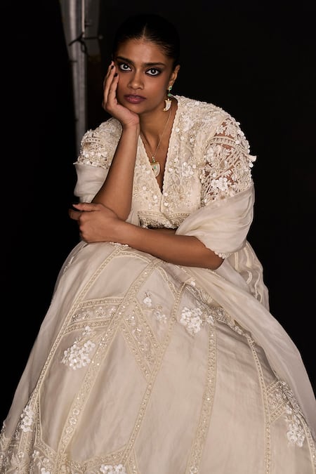 Shop Ridhi Mehra Ivory Net, Organza Sequins, Pearls V-neck Bloom Garden Bridal Lehenga Set at Aza Fashions Shop_Ridhi Mehra_Ivory Net, Organza Sequins, Pearls V-neck Bloom Garden Bridal Lehenga Set _at_Aza_Fashions